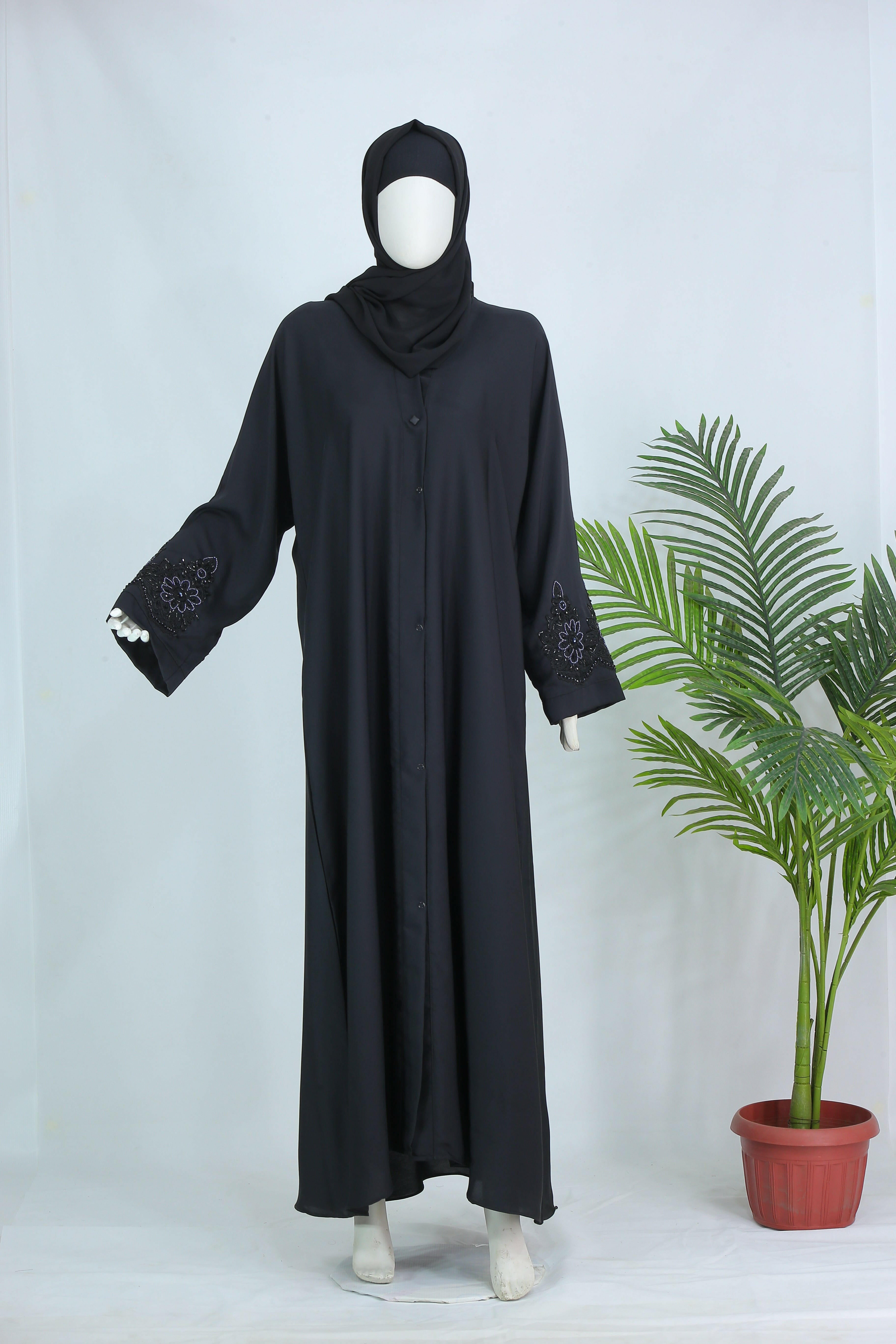 Clarity Glam Mahnoor abaya with free scarf in black with embroidered sleeves on mannequin